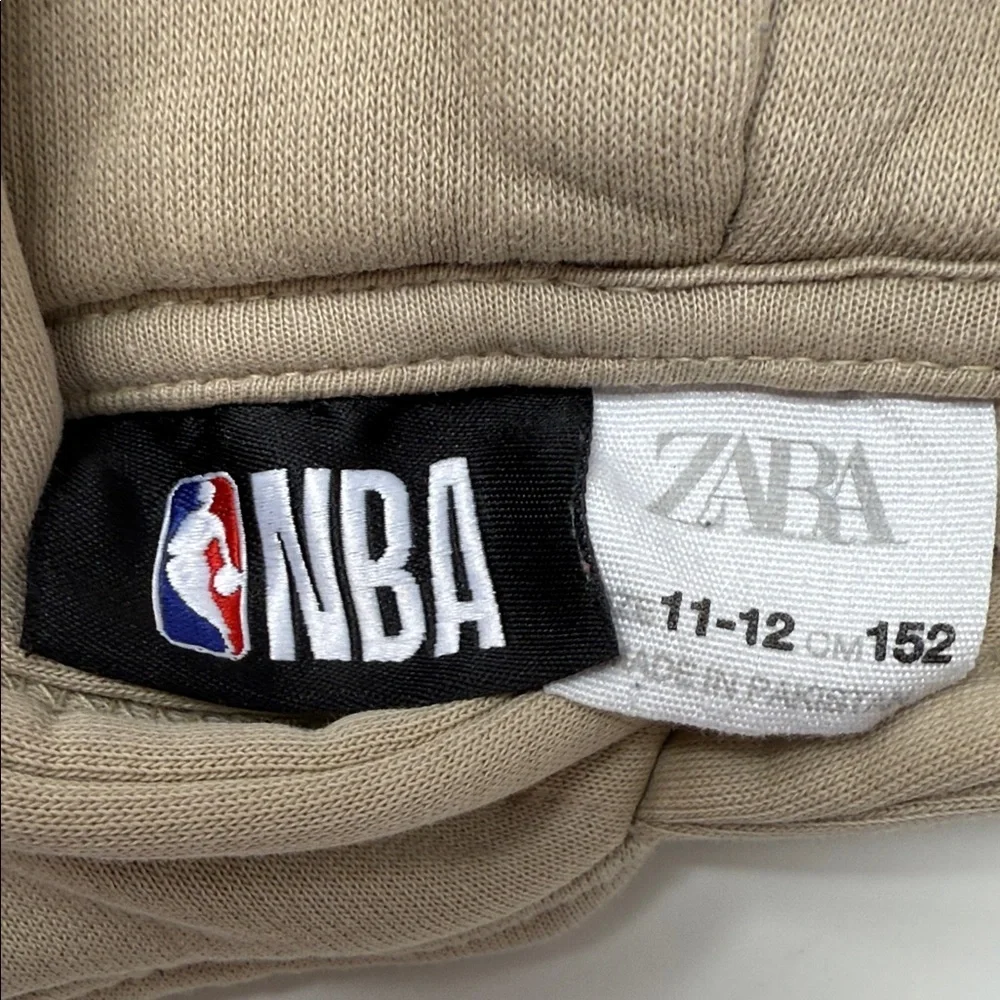NBA Logo Kid’s Zara Beige Hooded Sweatshirt with pocket and graphics -Size 11-12